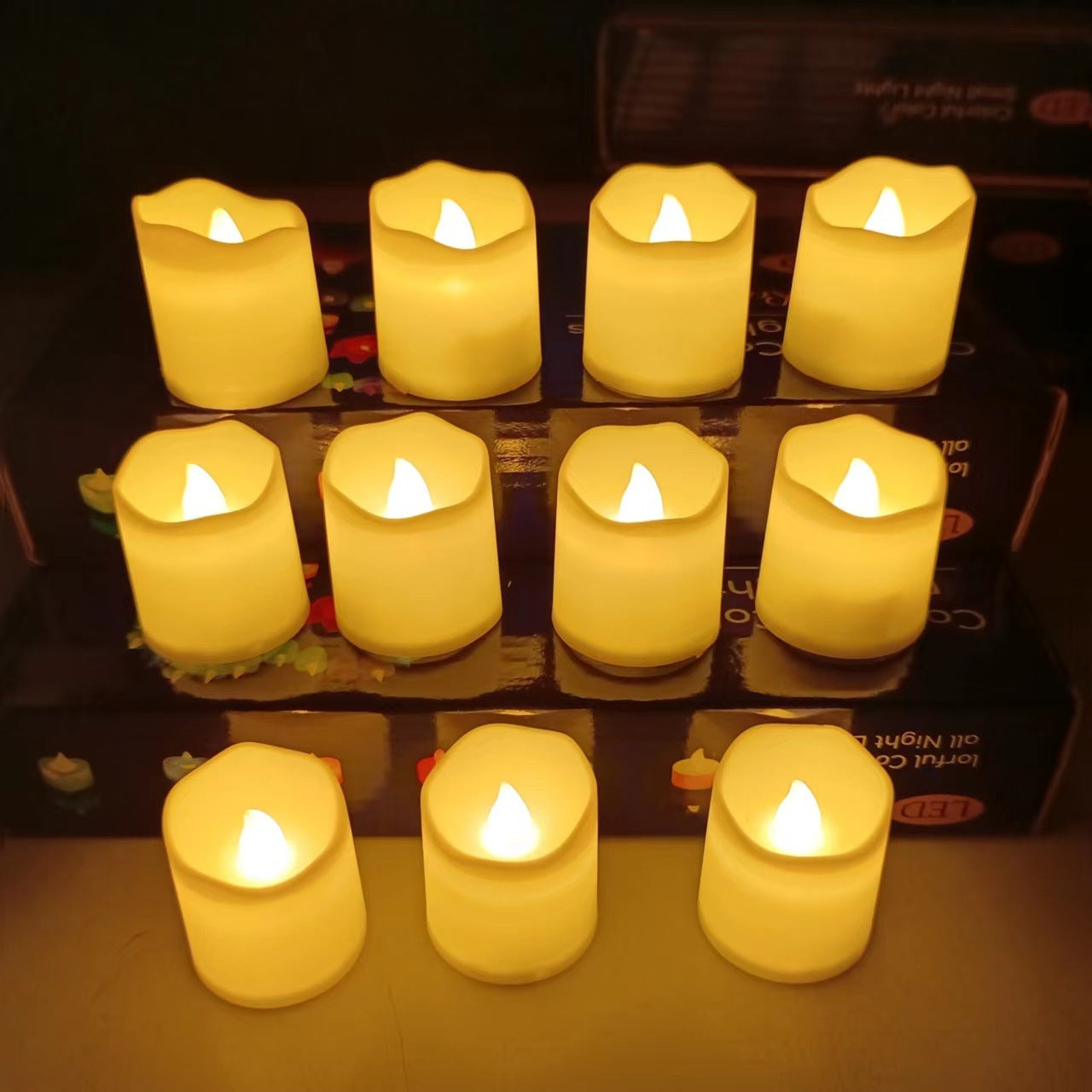 Sett med 6 korte, flammeløse, flakkende LED-lys av voks